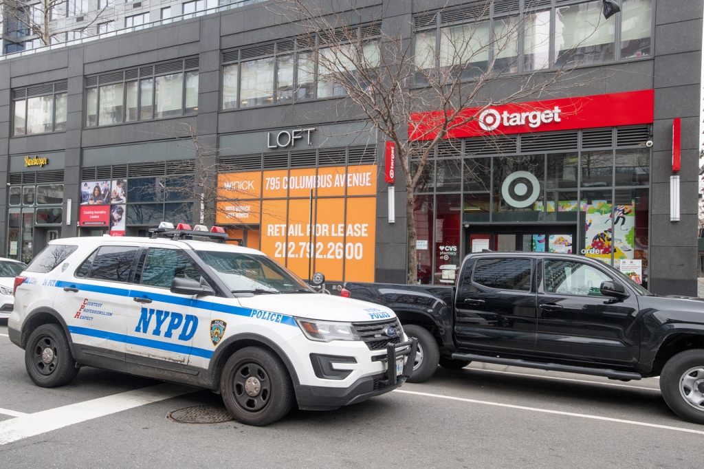 An NYPD cruiser is seen in front of a Manhattan Target store.