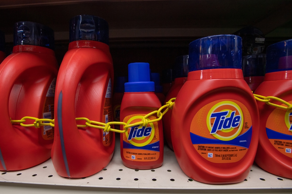 Chained up bottles of Tide detergent